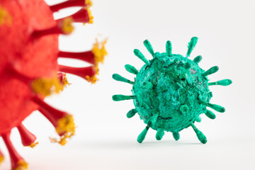 A photograph of two colorful 3D Virus artwork model forms. Inspired by the Covid-19 lockdown of 2020