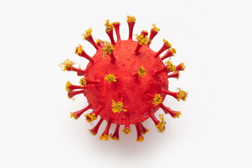 A photograph of a large red virus sculpture. The artwork inspired by the Covid-19 lockdown of 2020