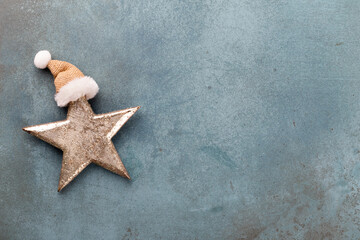 Fototapeta na wymiar Christmas decoration. Christmas star on rustic dark background.