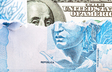 banknote of 100 reais from brazil hiding an american hundred dollar bill, concept of valued american currency, brazil in crisis