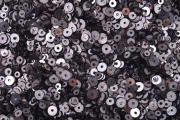 Silver,black sequin close-up on a background