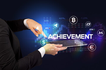 Close-up of a touchscreen with ACHIEVEMENT inscription, business opportunity concept