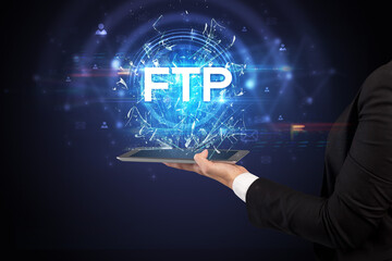 Close-up of a touchscreen with FTP abbreviation, modern technology concept