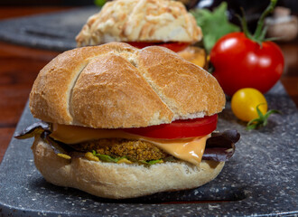 Healthy vegan or vegetarian fast food, fresh made plant based burgers with vegetables
