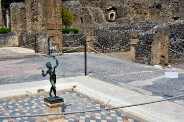 bronze statue dancing faun archaeological excavations  Pompeii Italy