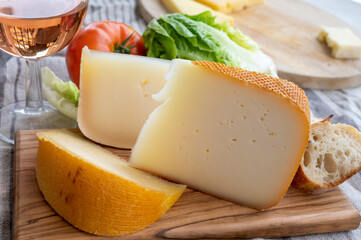 Cheese collection, French fol epi  cheese with many little holes, etorki  and ossau iraty cheese