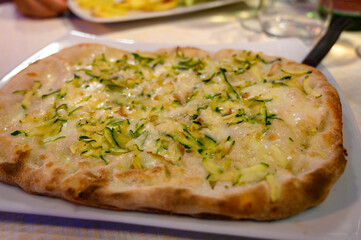 Pinsa romana, traditional italian food in Roma, variety of pizza