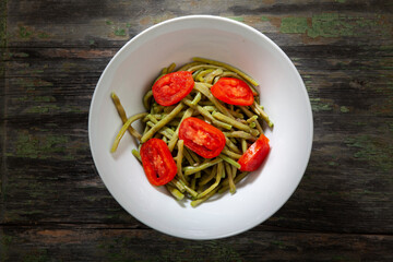 Green Beans in Wihte Bowl With Tomatoes