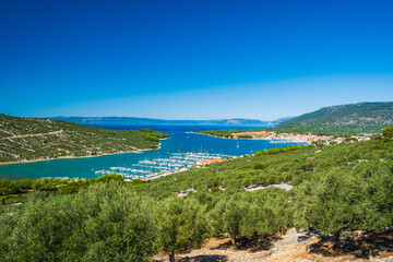 Panoramic view of Adriatic seascape, blue bay and town of Cres on the island of Cres in Croatia