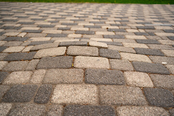 incorrectly laid paving slabs. holes and bumps in the road, uneven sidewalk.