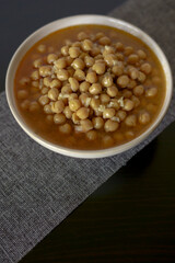 typical vegan dish of legumes with chickpeas, rice and soup 
