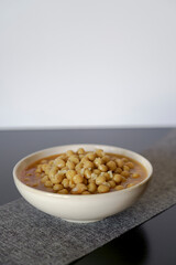 typical vegan dish of legumes with chickpeas, rice and soup 