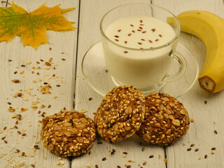 milk and cookies on wooden table