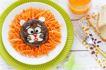 Fun Food for Kids - Lion shaped beef hamburger with carrots and cheese for a healthy lunch or dinner