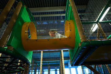 At the playground. Kids having fun. Brother and sisters forgetting about the dark times we are in. Sanitation and sterilization of the toys and apparatus are important to avoid spreading the covid-19 
