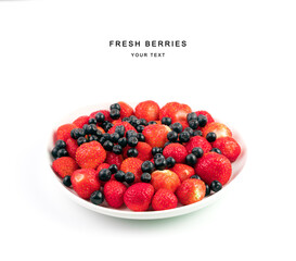 Collecting berries of mountain ash and strawberries in a plate on a light background with a place to copy. Berry background. The concept of natural products.