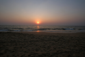 Naklejka premium Sunset at Candolim Beach, North Goa, India
