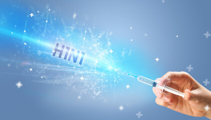 Syringe, medical injection in hand with H1N1 inscription, medical antidote concept