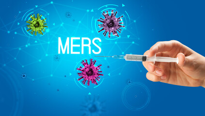 Syringe, medical injection in hand with MERS inscription, coronavirus vaccine concept