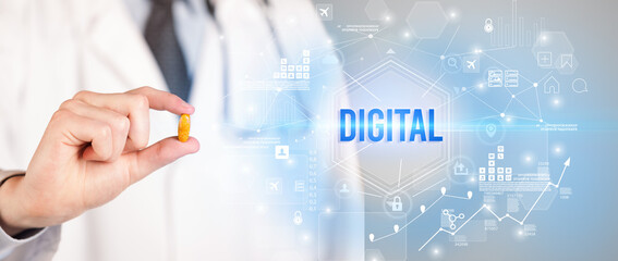 Obraz premium Doctor giving a pill with DIGITAL inscription, new technology solution concept