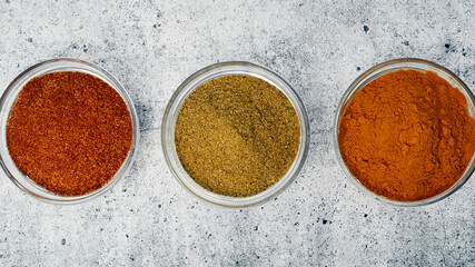 Spices and spices in glass saucers. Cooking and kitchen.