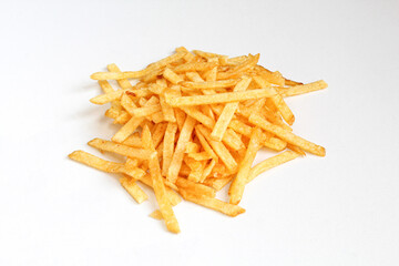 Portion of salty fried potato sticks isolated on white background