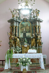 Main altar in the parish church of St. Leopold Mandic in Orehovica, Croatia