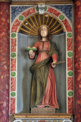 Saint Agatha, a statue on the main altar in the parish church of Our Lady of Mount Carmel in Bacva, Croatia