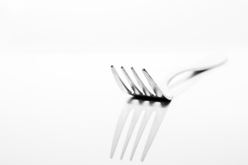 A fork on light background