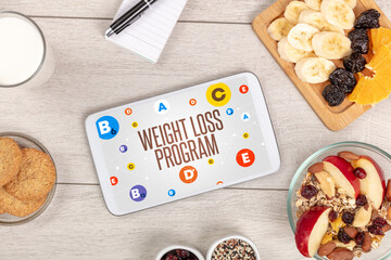 Healthy Tablet Pc compostion with WEIGHT LOSS PROGRAM inscription, weight loss concept