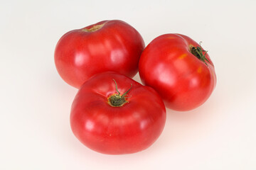Red ripe tomato isolated on white