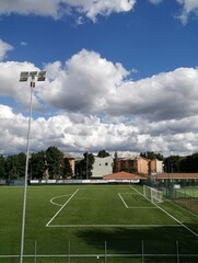 Football soccer field with cloudly sky