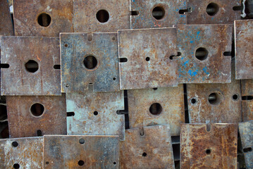 rusty metal background texture many squares with holes