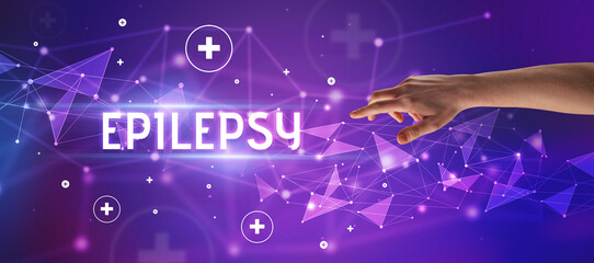 Close-Up of cropped hand pointing at EPILEPSY inscription, medical concept