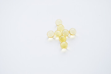 Yellow capsules of vitamin omega 3. Dietary Supplement. Fish oil in capsules.