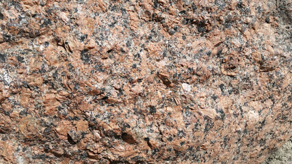 Red granite. Red granite texture. Background with vintage granite surface