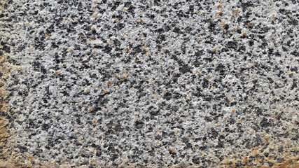 Gray granite. Unfocused granite surface. Vintage background of gray granite