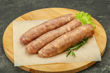 Raw pork meat sausages for grill