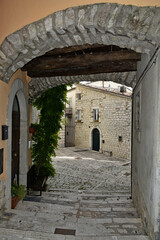 A narrow street among the old houses of Ferrazzano, a medieval village in the Molise region.
