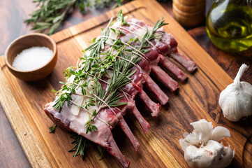 tied lamb rack with herbs for roast