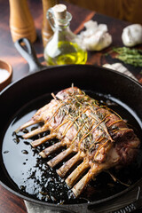 lamb rack roast on skillet pan