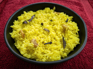 Bowl with tasty fried riceas Indian home made dish