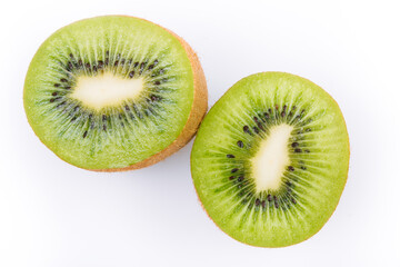 Slices of kiwi on bright background