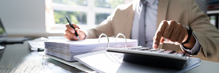 African American Accountant Manager Doing Accounting