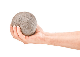 Fototapeta premium Hand holding stone ball. Piece of stone isolated on white
