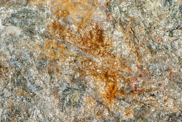 Alpine close-up grunge stone or rock texture in different colours