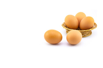 eggs in a basket isolated on white 