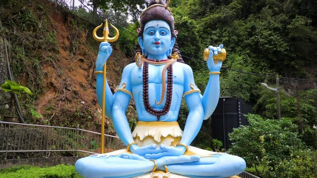 Shiva statue slow-motion shot, gimbal shot of hindu goddess Shiva hinduism holy statue in Penang island Malaysia
