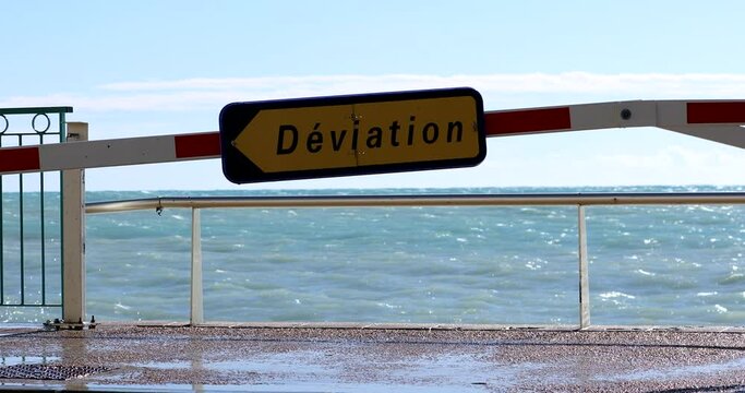A French Road Deviation Sign, Menton Sea Front Is Closed Due To Flooding Caused By Huge Waves - DCi 4K Resolution
