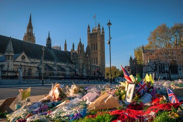 Flowers left on Parliament Square in London following the terrorist attack on Westminster on 22nd...